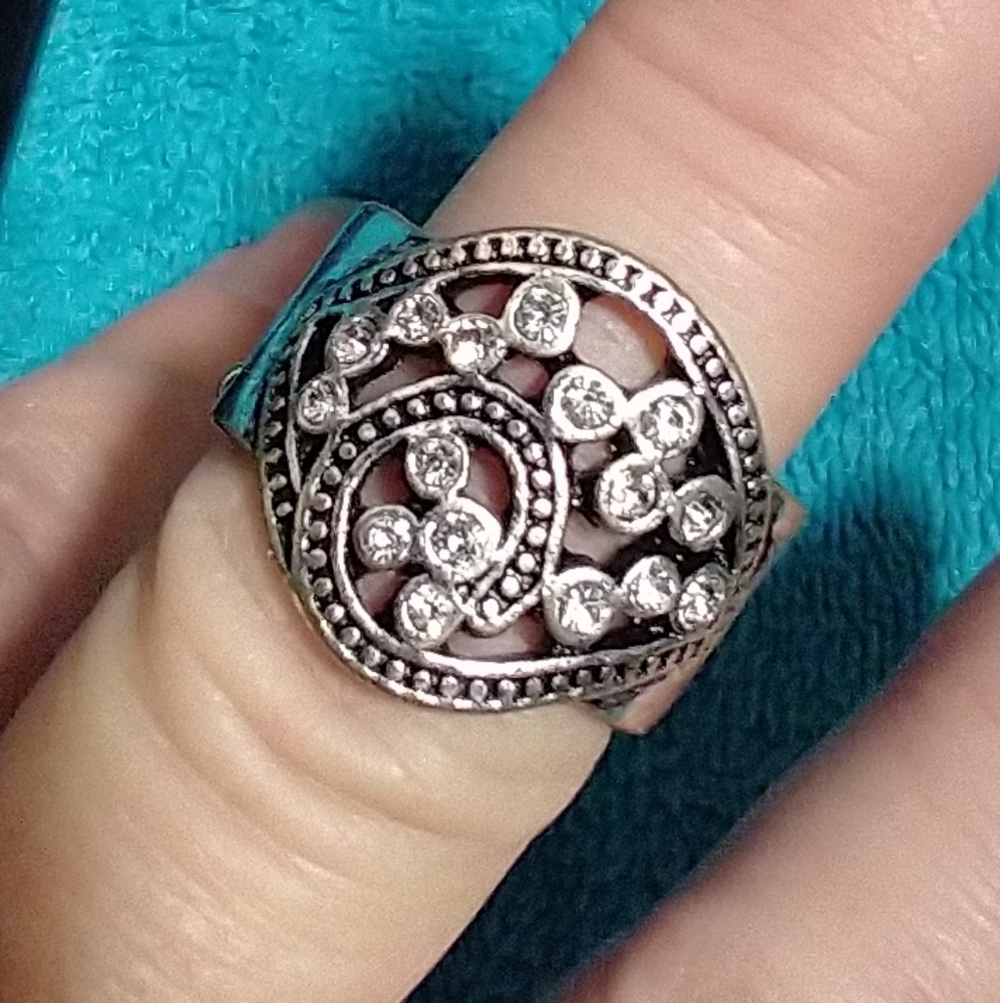 Elegant Silvertone Stretch Ring with Crystal Accents